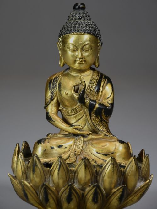 Superb Quality Gilt Bronze Tibetan Buddha Seated Within a Lotus Flower Base