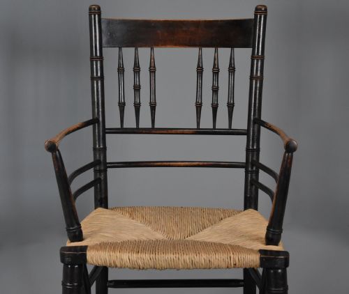 fig 2. Late 19th century ebonised Sussex armchair attributed to Morris & Co.