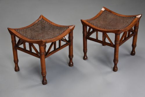fig 1. Pair of early 20th century walnut Thebes stools, designed by Liberty & Co.
