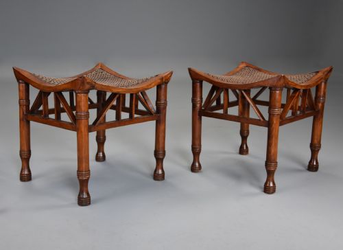 fig 2. Pair of early 20th century walnut Thebes stools, designed by Liberty & Co.