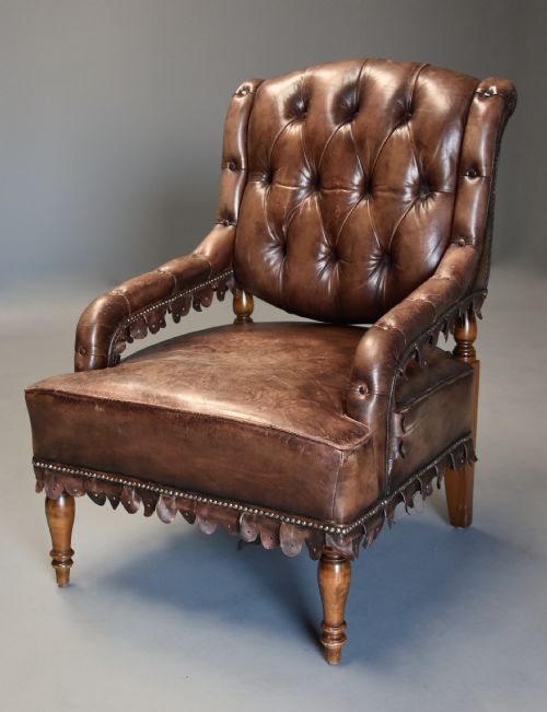 fig 1. Highly decorative French brown leather open armchair, the leather of nicely worn appearance