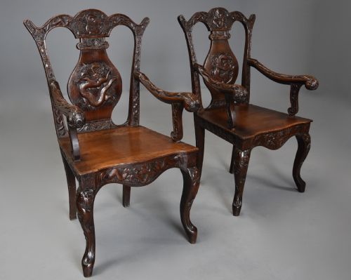 fig 2. Pair of highly decorative 19thc walnut open armchairs of Chinese influence in the 18thc style