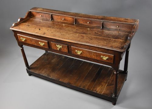 fig 1. Mid 18th century oak potboard dresser base of superb patina