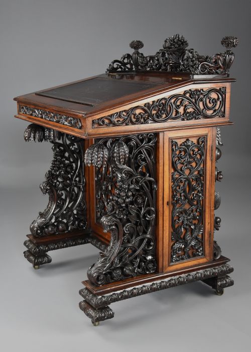 fig 1. Exquisite mid 19thc Anglo Indian padouk & satinwood profusely carved freestanding davenport of large scale