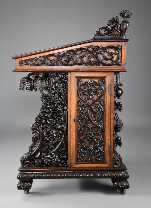 fig 3. Exquisite mid 19thc Anglo Indian padouk & satinwood profusely carved freestanding davenport of large scale
