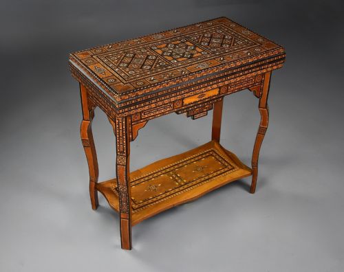 fig 1. Highly decorative early 20th century Middle Eastern Damascus inlaid games table