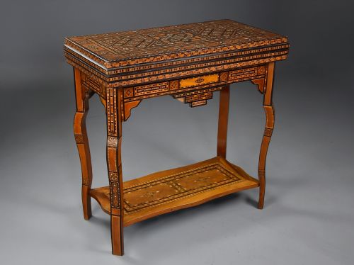 fig 2. Highly decorative early 20th century Middle Eastern Damascus inlaid games table