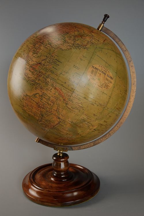 fig 1. Early 20thc Philips 19 inch terrestrial table globe supported on walnut base
