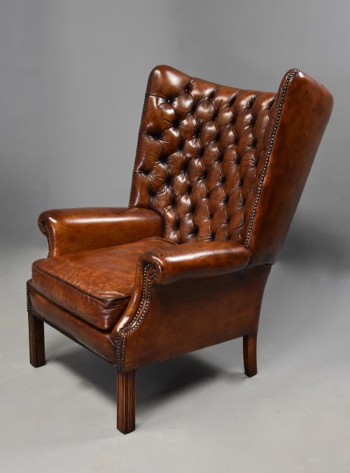 fig 1. Edwardian deep button brown leather hall porter's chair in the Georgian style