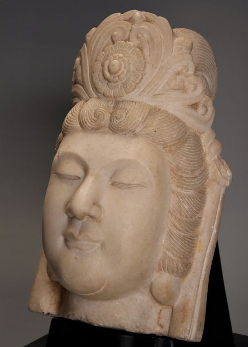 fig 1. Late 19th century highly decorative carved marble head of Guan Yin