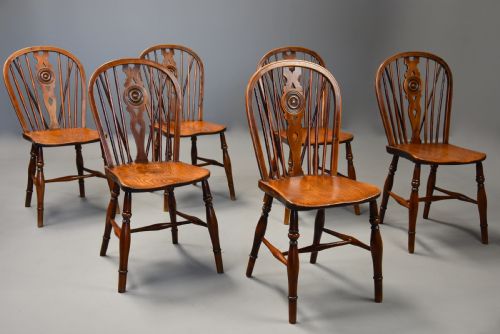fig 1. Rare set of six mid 19th century yew wood low back Windsor chairs of superb patina