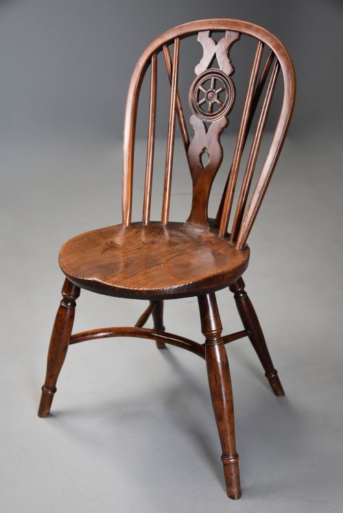 fig 1. Rare early 19th century yew wood wheelback Windsor chair with excellent patina