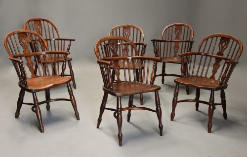 fig 1. Mid 19th century well matched set of six yew wood low back Windsor armchairs