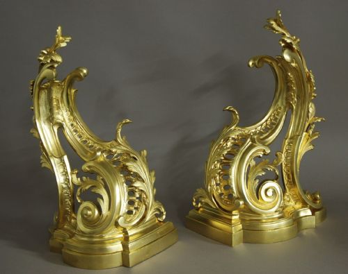 fig 1. A pair of late nineteenth-century French Rococo style gilt bronze chenets with asymmetric acanthus scrolls and lattice work.