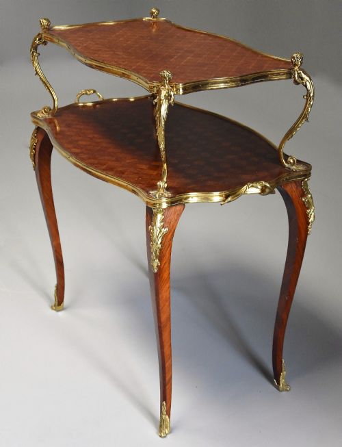 fig 1. Fine quality late 19thcentury French Kingwood parquetry two tier serpentine shaped etagere