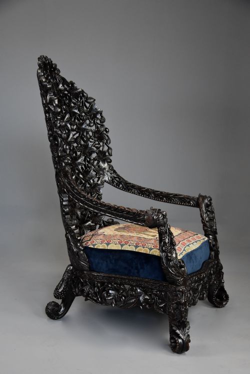 RARE HIGHLY DECORATIVE MID 19TH CENTURY INDIAN CARVED BLACKWOOD ARMCHAIR OF SUPERB QUALITY - ADDITIONAL PHOTO 5