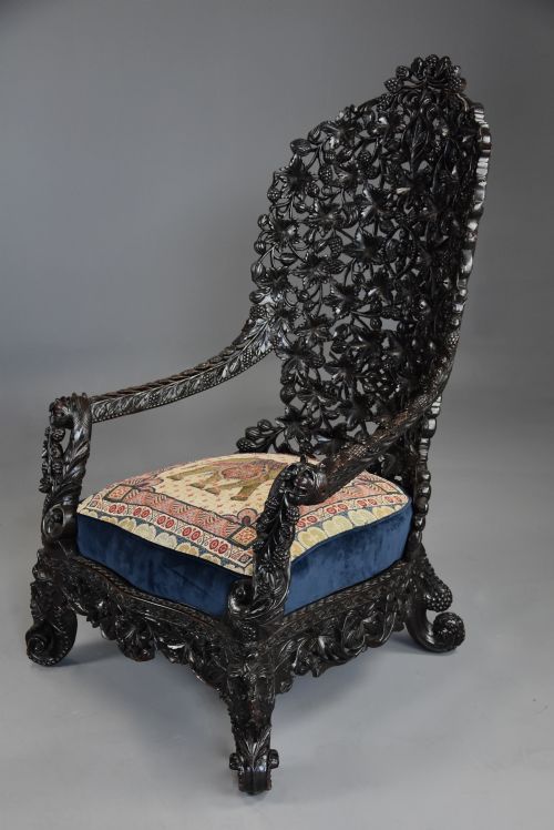 RARE HIGHLY DECORATIVE MID 19TH CENTURY INDIAN CARVED BLACKWOOD ARMCHAIR OF SUPERB QUALITY - ADDITIONAL PHOTO 6