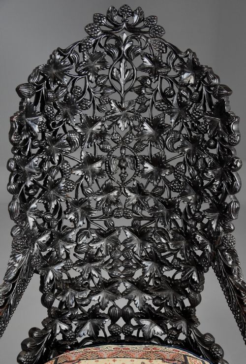 RARE HIGHLY DECORATIVE MID 19TH CENTURY INDIAN CARVED BLACKWOOD ARMCHAIR OF SUPERB QUALITY - ADDITIONAL PHOTO 7