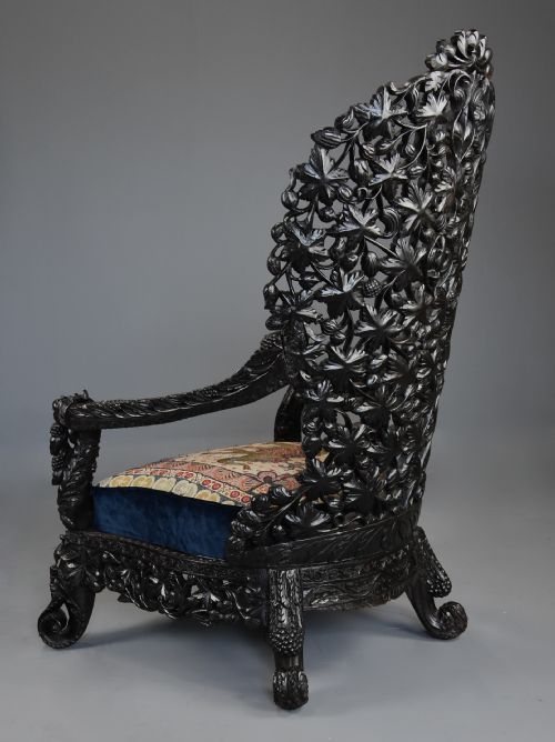 RARE HIGHLY DECORATIVE MID 19TH CENTURY INDIAN CARVED BLACKWOOD ARMCHAIR OF SUPERB QUALITY - ADDITIONAL PHOTO 11