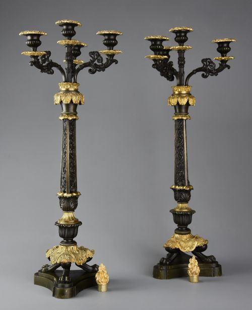 fig 2. A pair of mid-19th century French Regence style candelabra crafted from patinated dark bronze with gilt bronze foliage mounts and three scrolled branches.