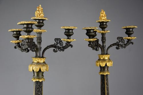 fig 3. A pair of mid-19th century French Regence style candelabra crafted from patinated dark bronze with gilt bronze foliage mounts and three scrolled branches.