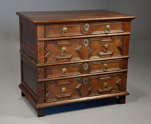 LATE 17TH CENTURY OAK MOULDED FRONT CHEST OF DRAWERS WITH FINE FADED PATINA