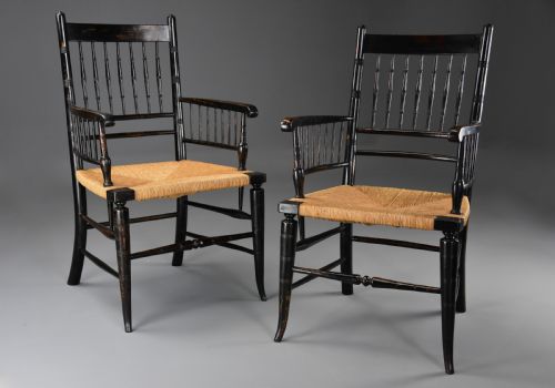 RARE UNUSUAL PAIR OF LATE 19TH CENTURY HIS HERS EBONISED SUSSEX ARMCHAIRS ATTRIBUTED TO MORRIS CO