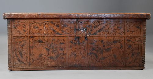 fig 2. Early seventeenth-century Northern Italian cypress wood coffer decorated with detailed incised panels depicting mythical beasts and heraldic symbols.