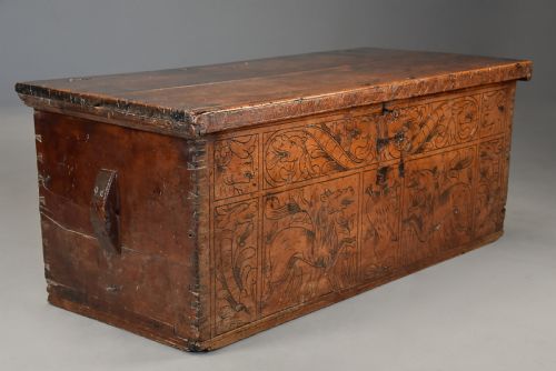 fig 3. Early seventeenth-century Northern Italian cypress wood coffer decorated with detailed incised panels depicting mythical beasts and heraldic symbols.