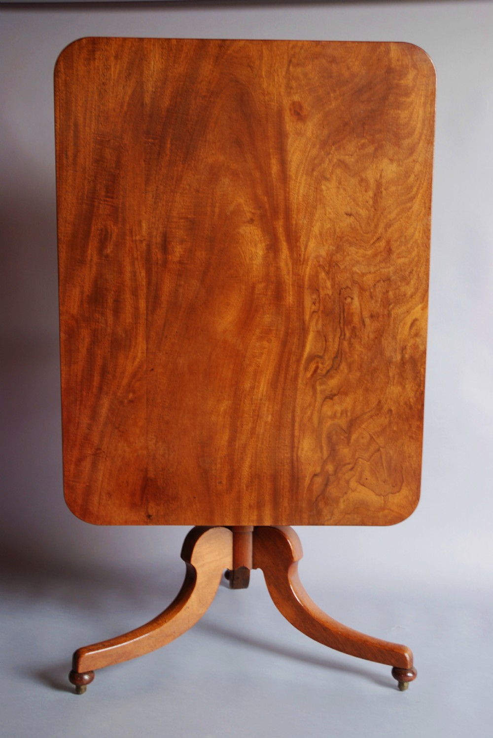 Mid 19thc mahogany tilt top dining table of good colour