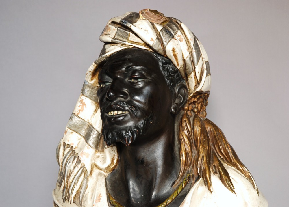 Highly decorative Austrian painted life size terracotta bust of a Nubian man