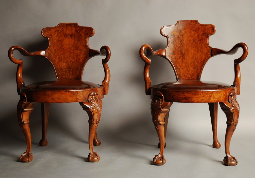 Pair of early 20thc walnut open arm library chairs, in the 'Gillows' manner