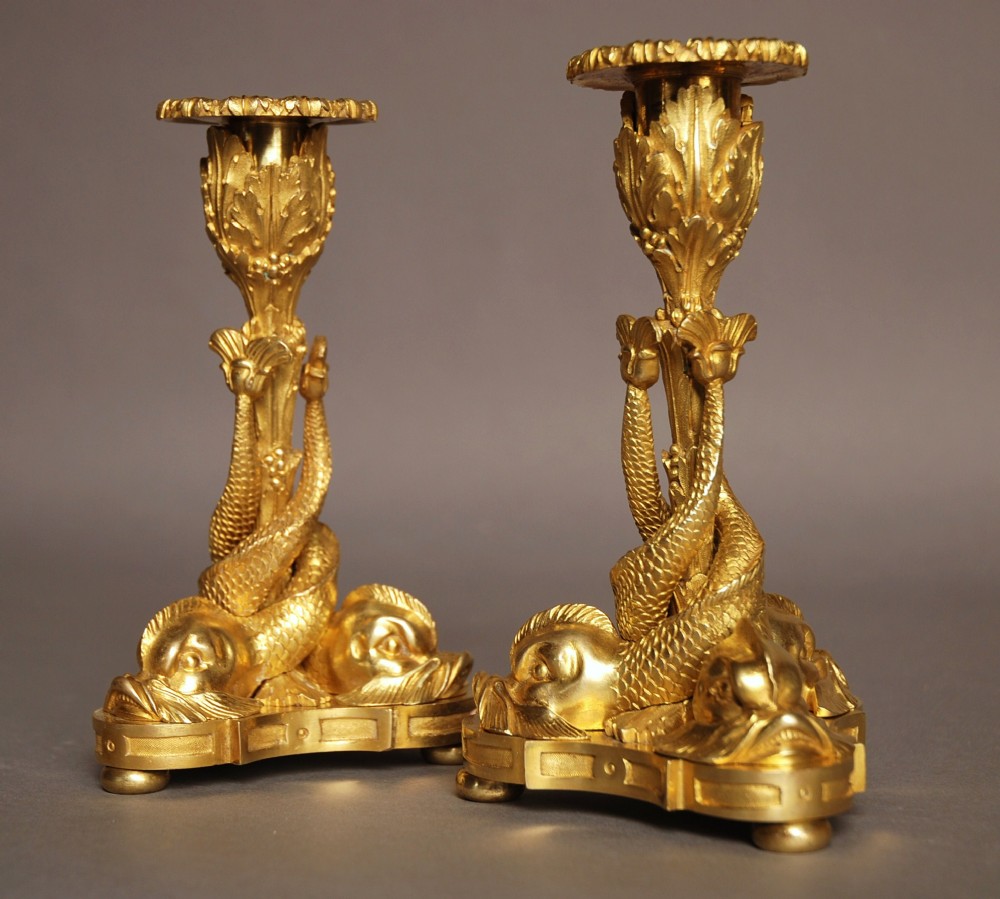 Fine quality pair of ormolu candlesticks with entwined dolphins
