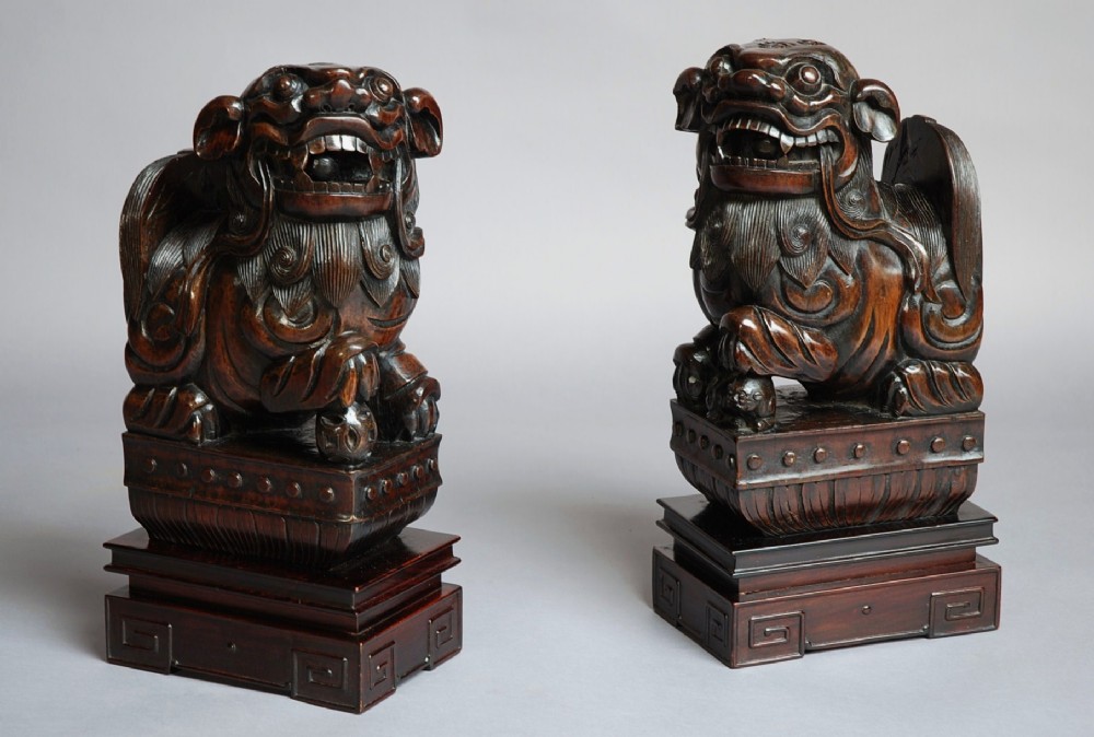 Pair of Chinese hardwood Fu Lions of superb quality