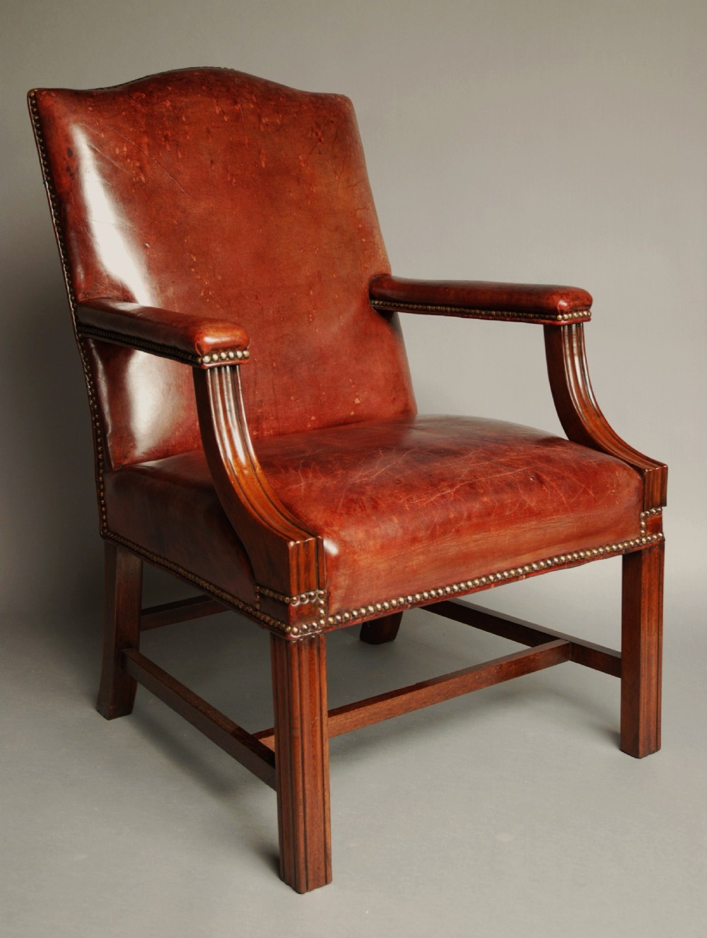 Worn leather Gainsborough chair
