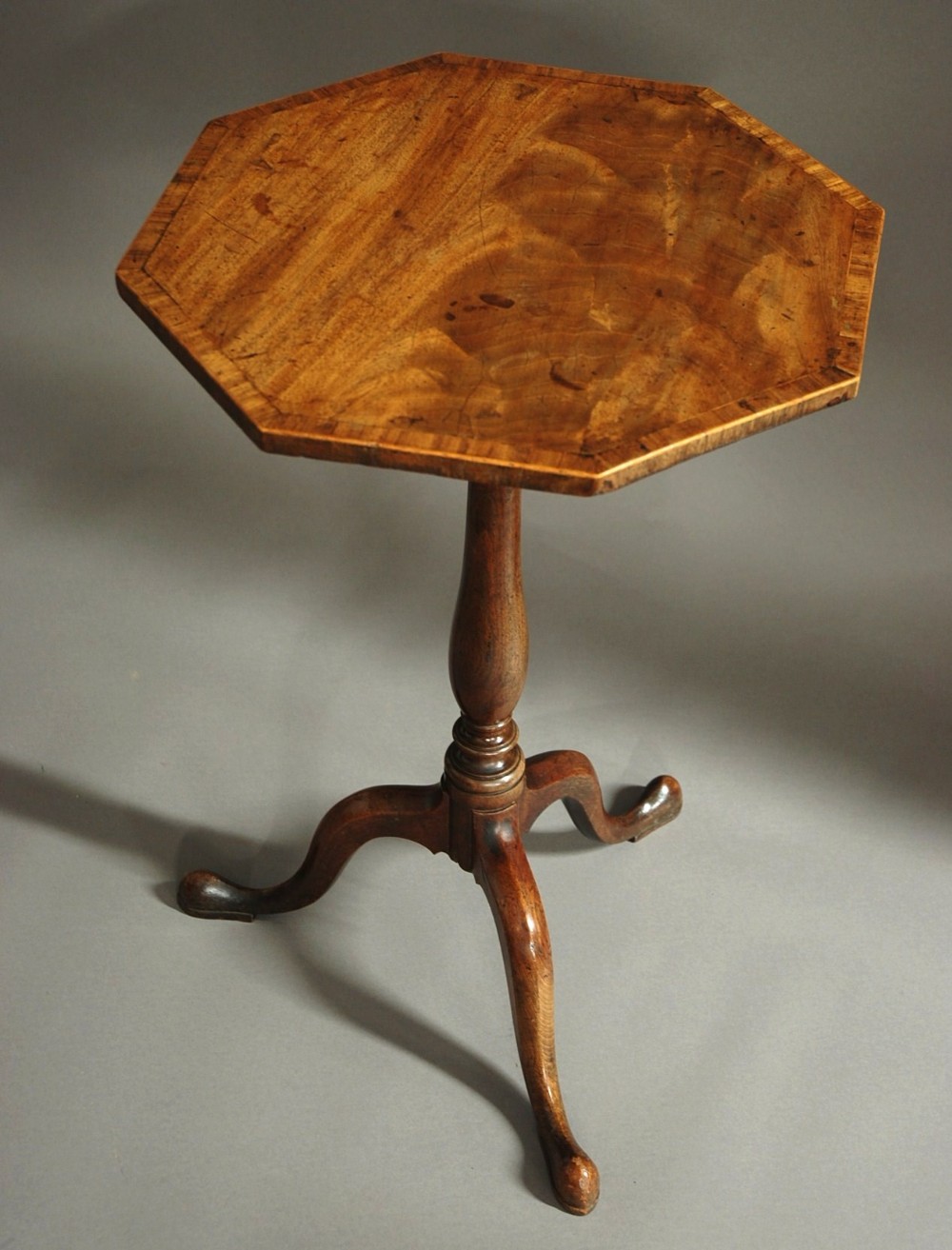George III octagonal mahogany tilt top table of superb patina