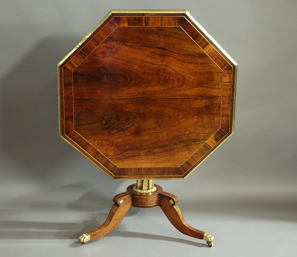 Early 19th century Regency tilt top rosewood centre table of octagonal form