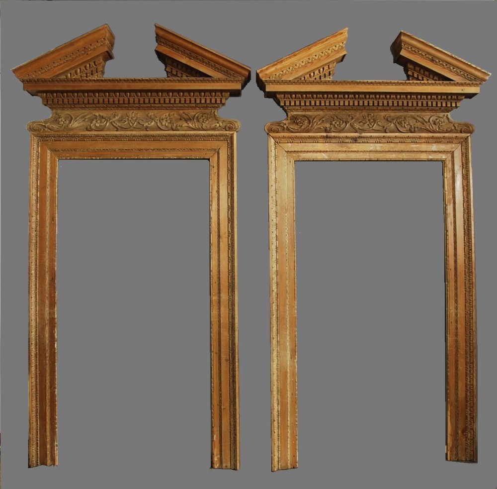 Large impressive pair of mid 18th century pine door surrounds