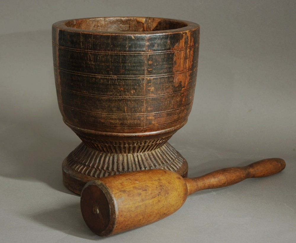 Decorative hardwood pestle & mortar of large proportions