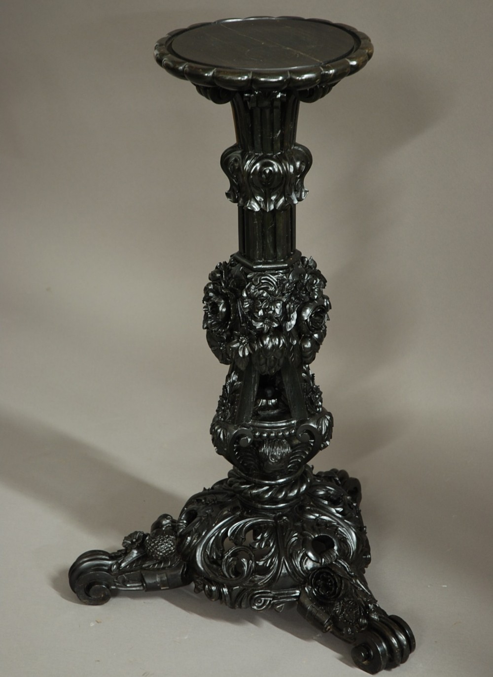 A superb quality Ceylonese solid ebony carved stand