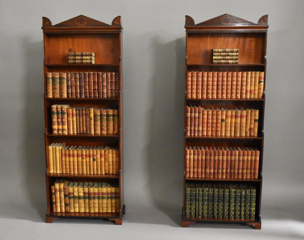Pair of Regency mahogany waterfall bookcases of small proportions
