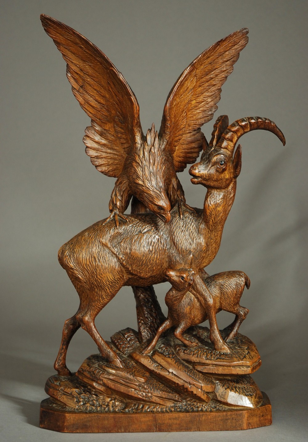 19th century Black Forest carving of ibex and eagle 