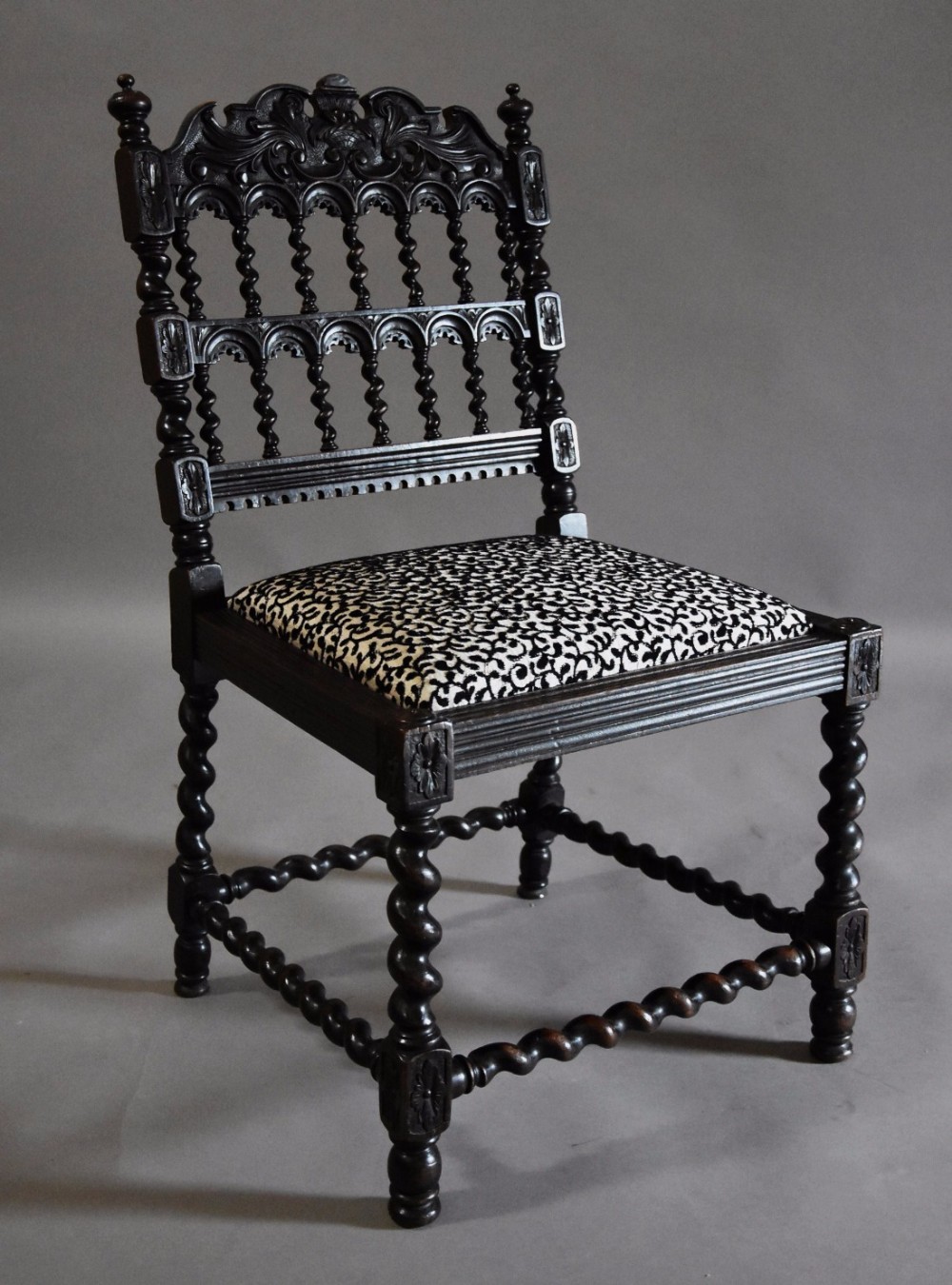 English 19th century ebonised chair in the style of a 17thc Anglo Indian chair