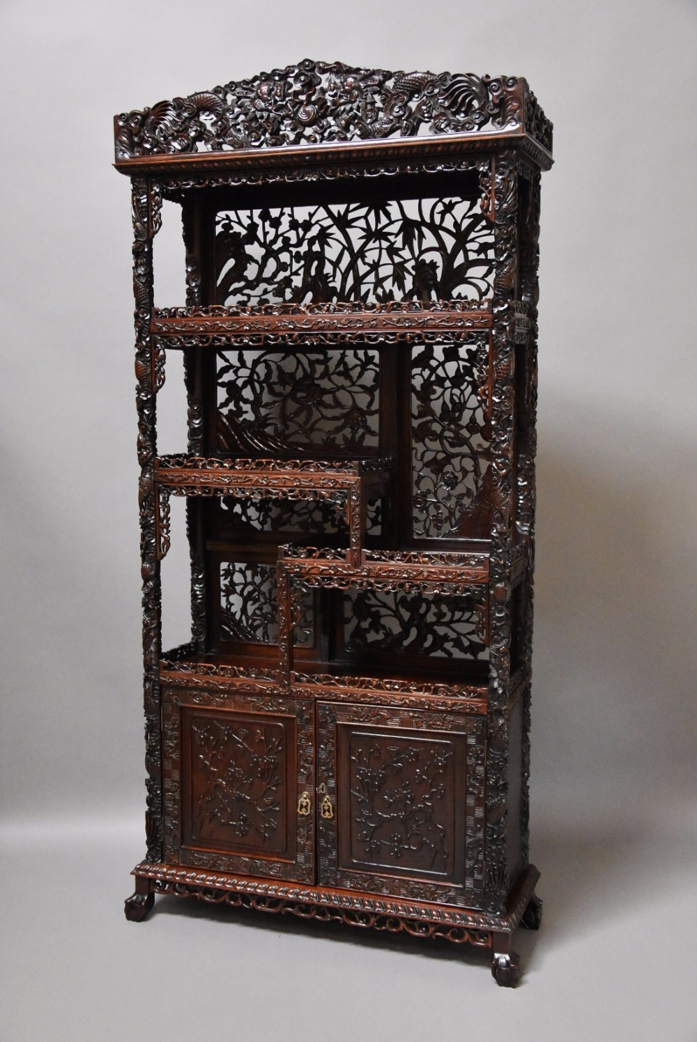 Late 19th century Chinese superb quality carved padouk display cabinet