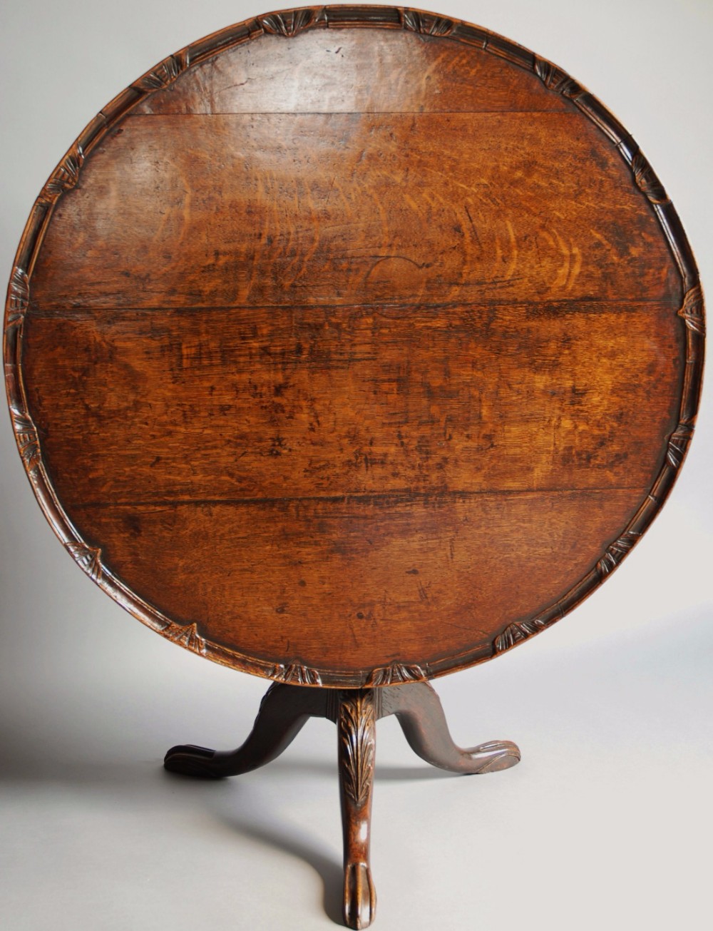 Late 18th century oak provincial tripod tilt top table of large proportions and good patina