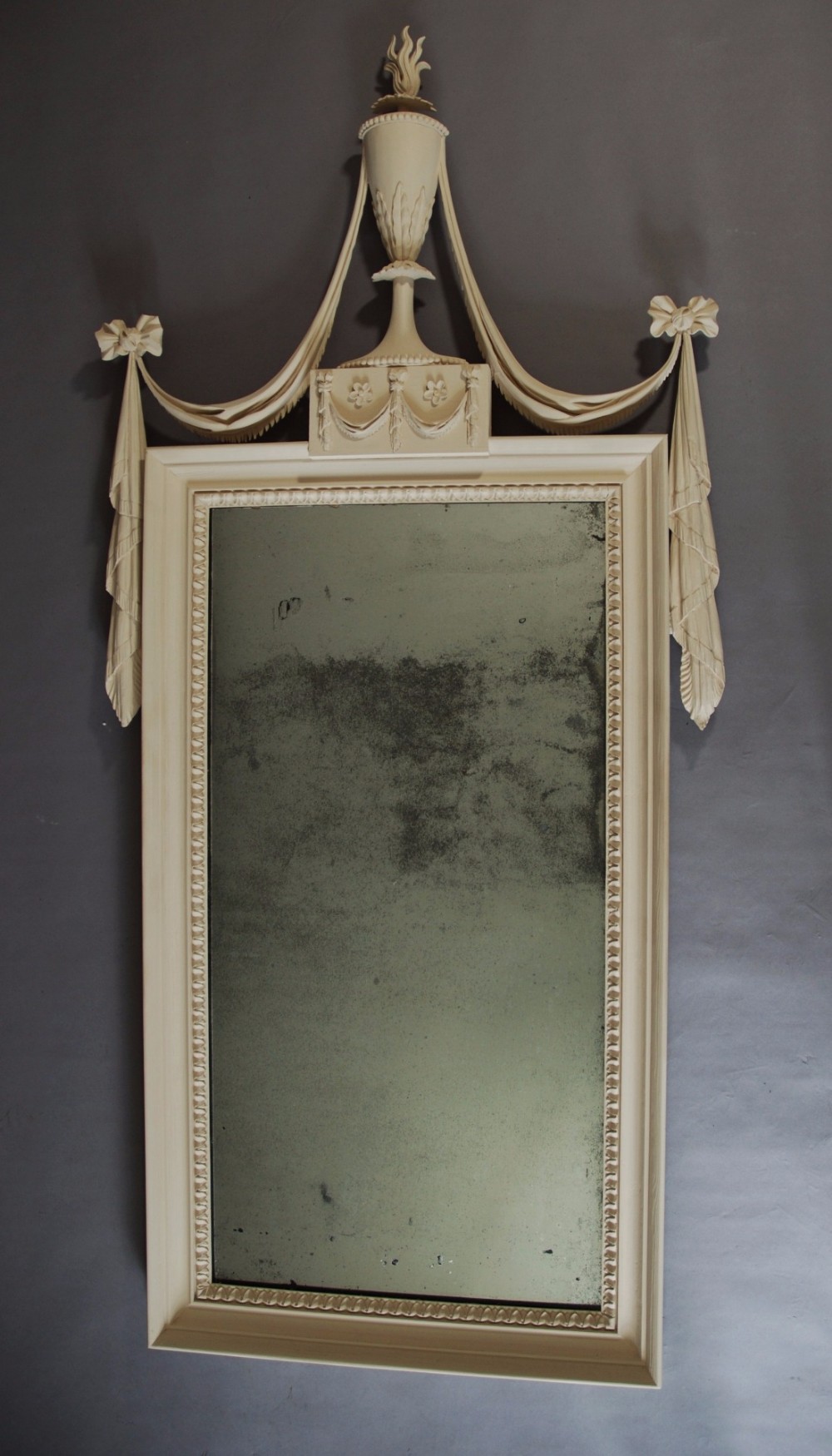 Finely carved 19th century pine mirror in the Adam style 
