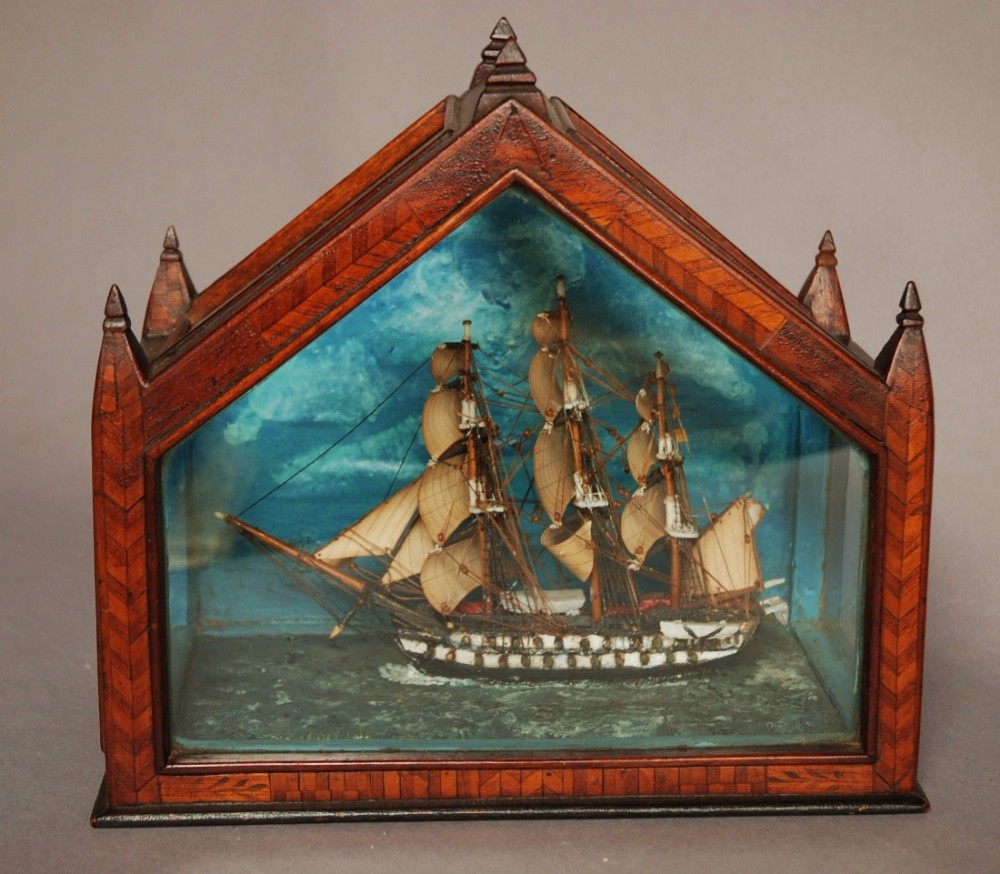 19th century folk art diorama of a model galleon in glazed mahogany case 