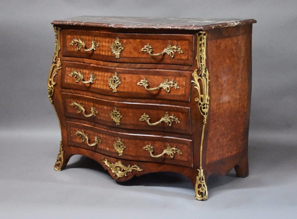 19th century French Kingwood bombe serpentine commode with marble top