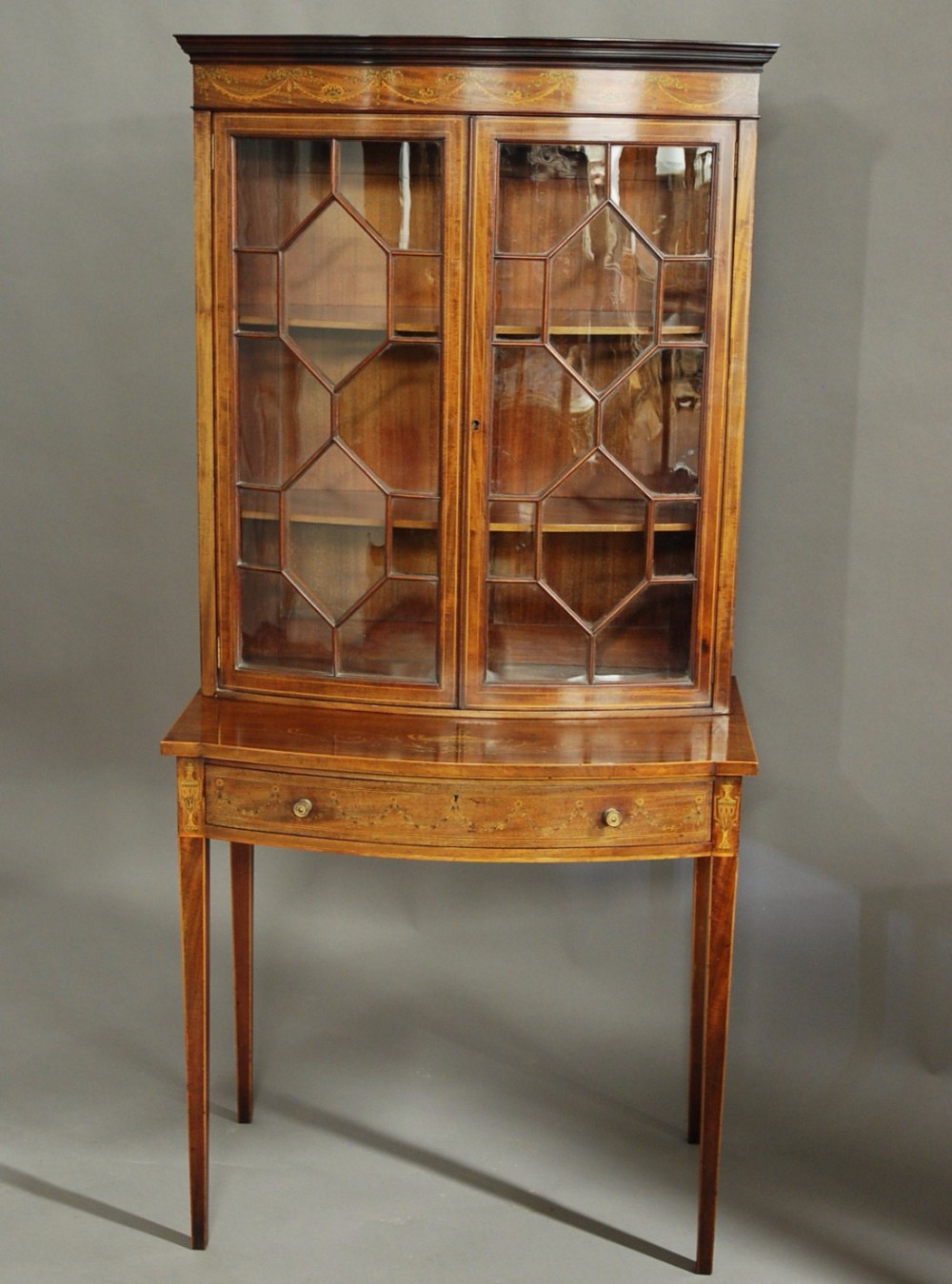 Edwardian inlaid mahogany bow front glazed display cabinet