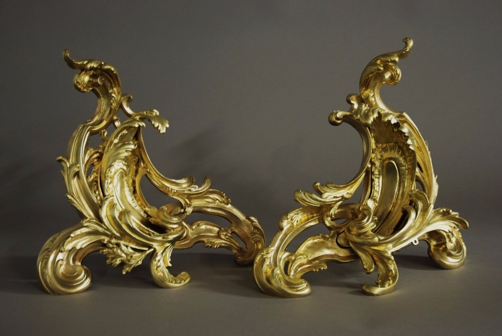Pair of late 19thc highly decorative ormolu chenets in the Rococo style